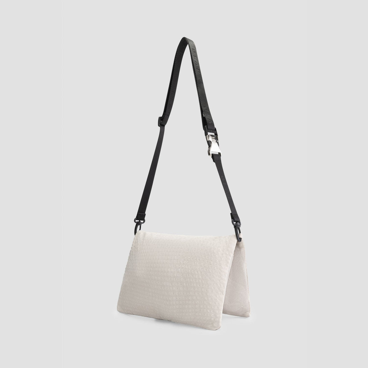 OLAF SEERSUCKER PASSPORT BAG | CEMENT
