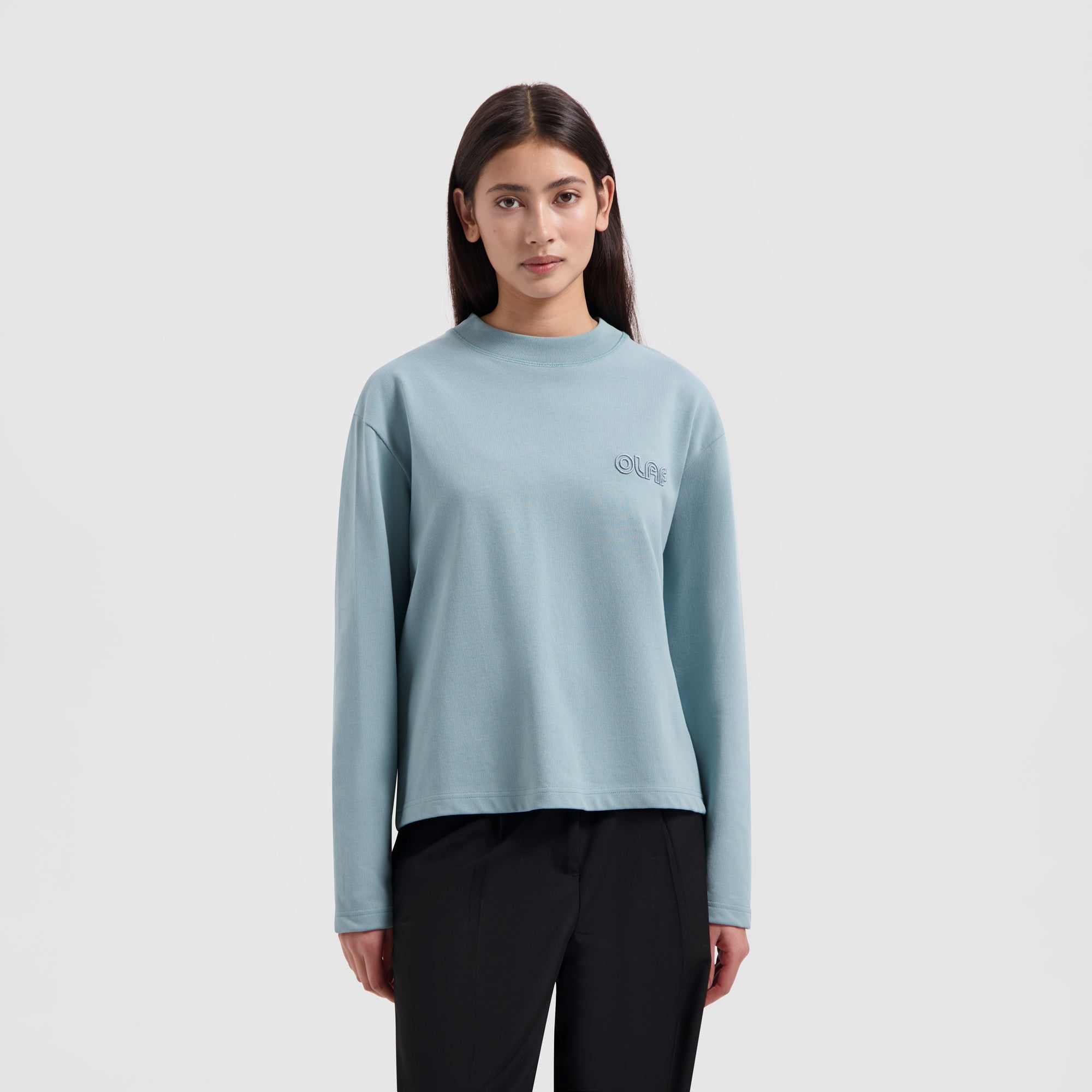 WMN Outline Logo LS - Light Teal Blue