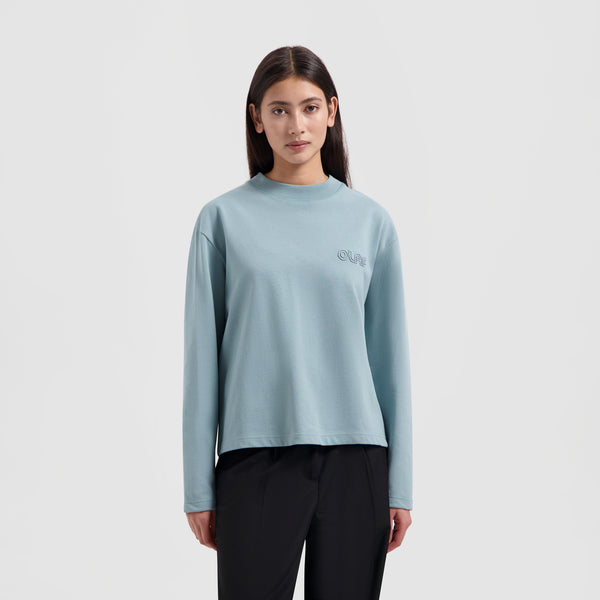 WMN Outline Logo LS - Light Teal Blue