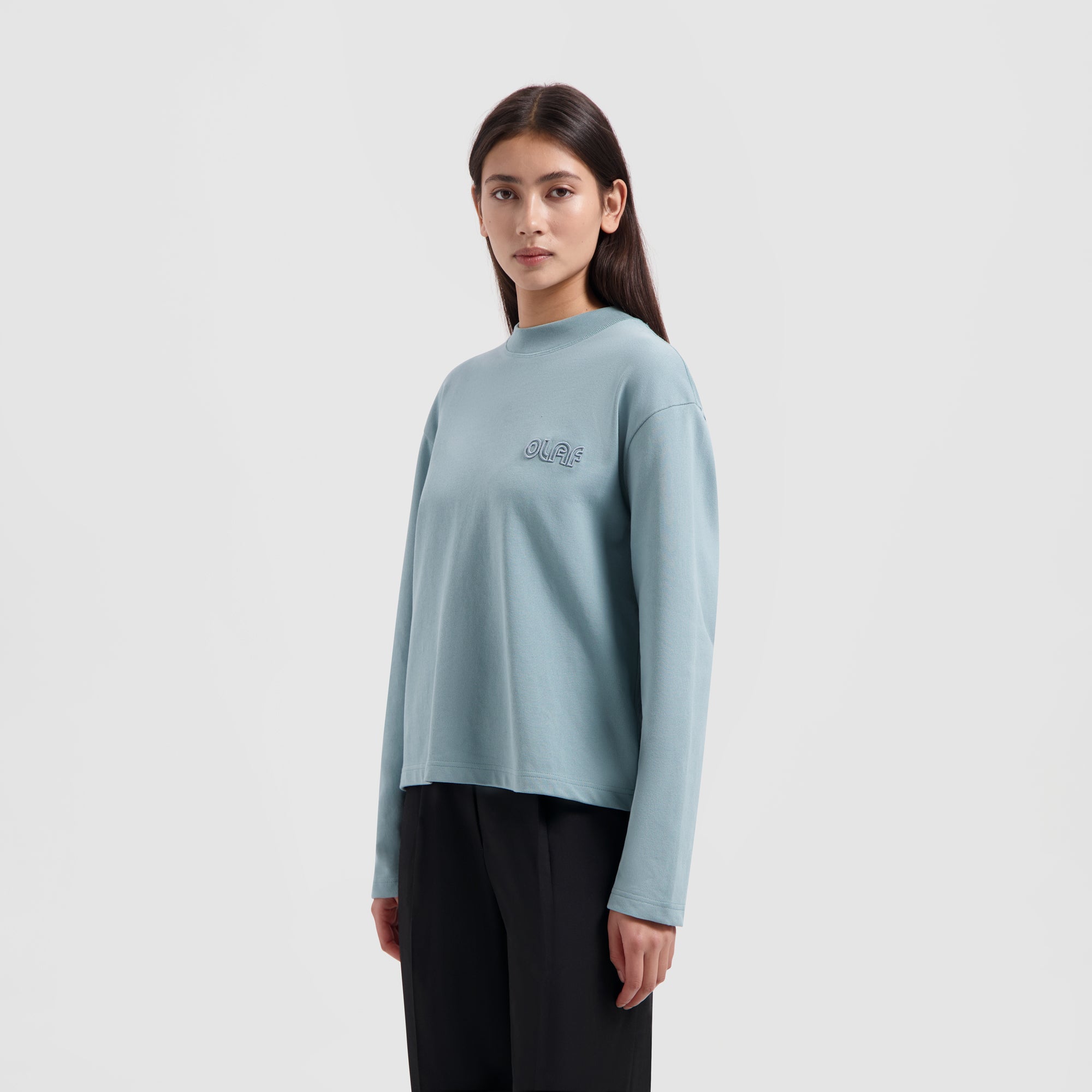 WMN Outline Logo LS - Light Teal Blue
